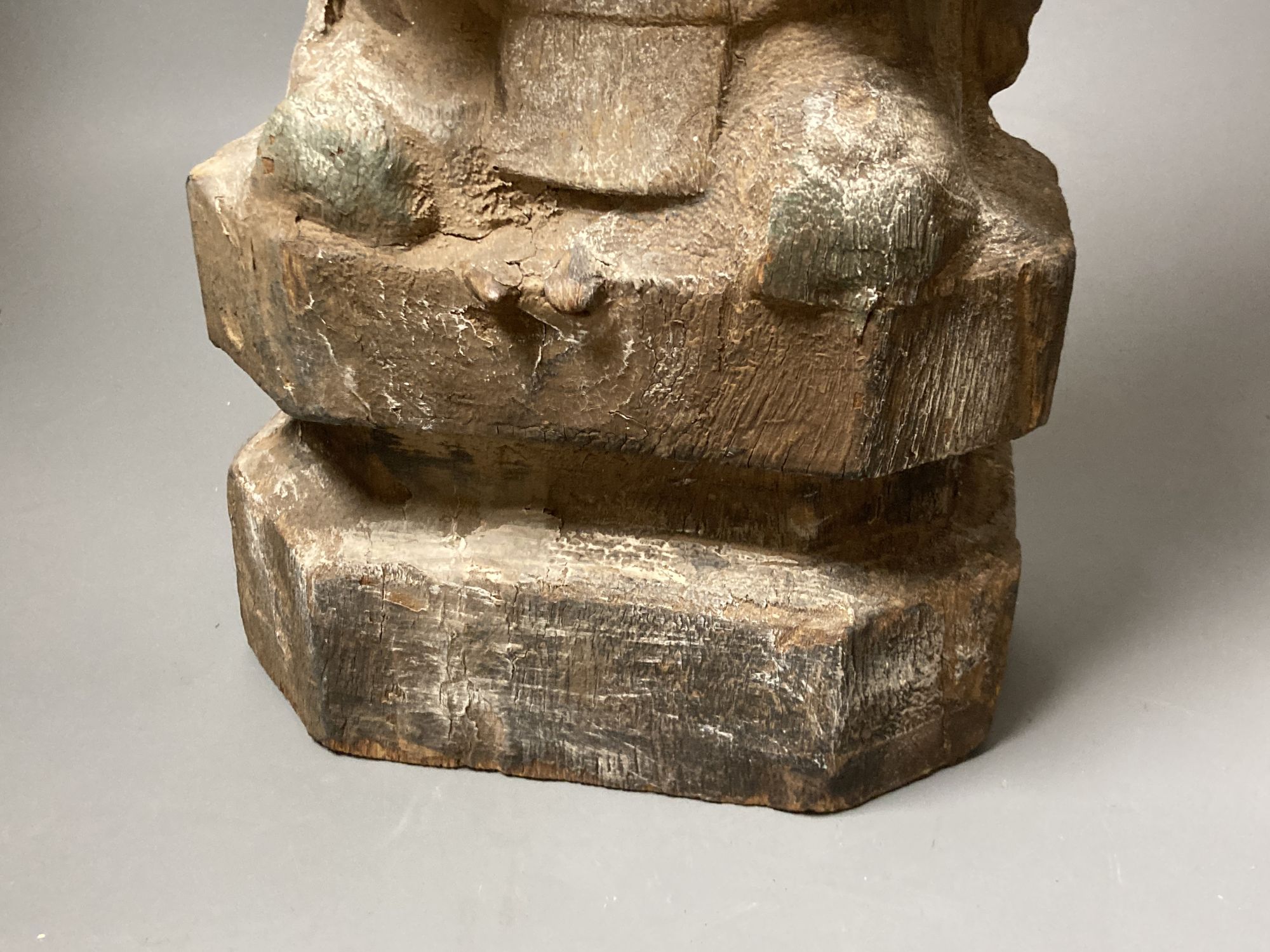 A Chinese carved wood deity, height 60cm